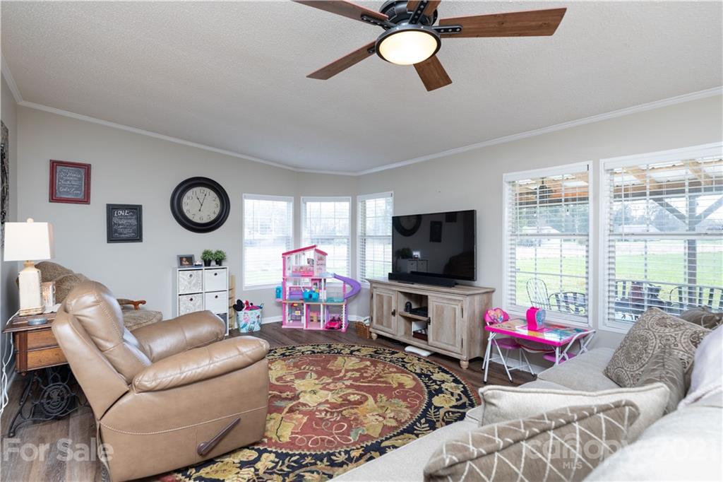 854 West Rambo Road Rock Hill, SC 29730 - Photo 10 of 27 a living room with furniture and a flat screen tv