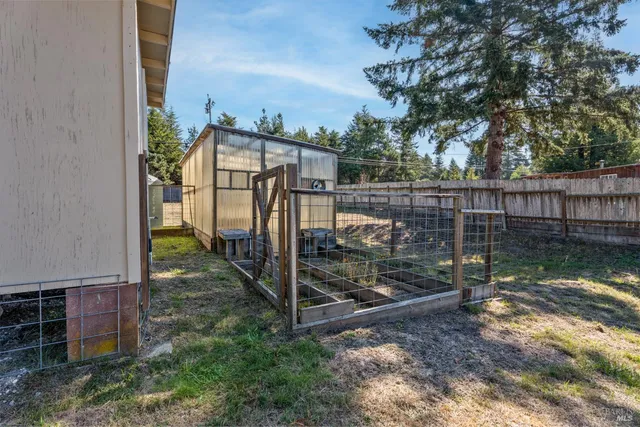 a view of a wrought iron fences in front of house
