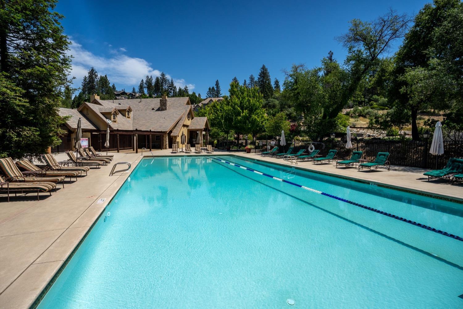 1575 Ridgemore Drive Meadow Vista, CA 95722 - Photo 13 of 29 a view of a swimming pool with lounge chair