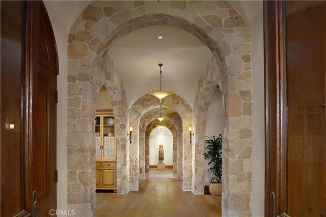 a large mirror with glass door