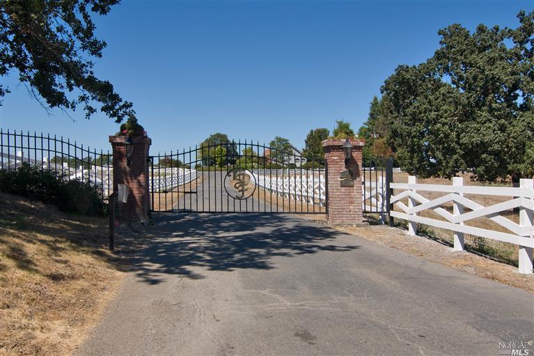 4255 River Road Windsor, CA 95492 - Photo 1 of 1 a view of a yard with wooden fence