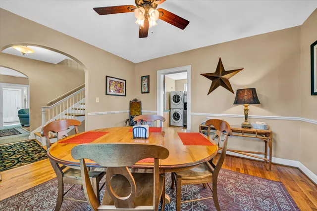 a bed room with a bed and a chandelier