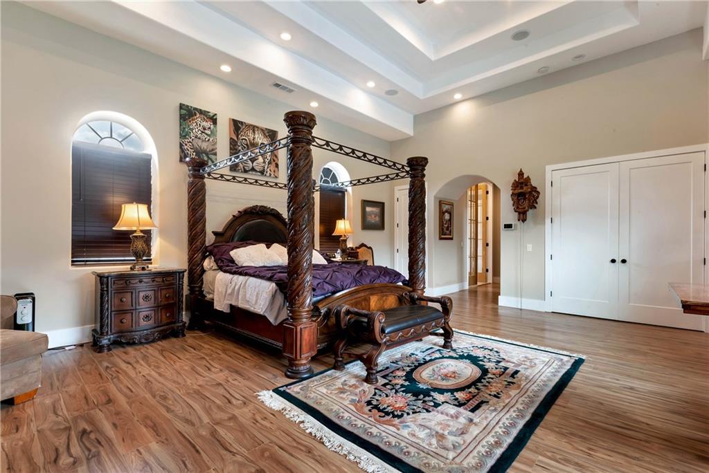 1197 Dee Kennedy Road Auburn, GA 30011 - Photo 20 of 78 a living room with furniture and wooden floor