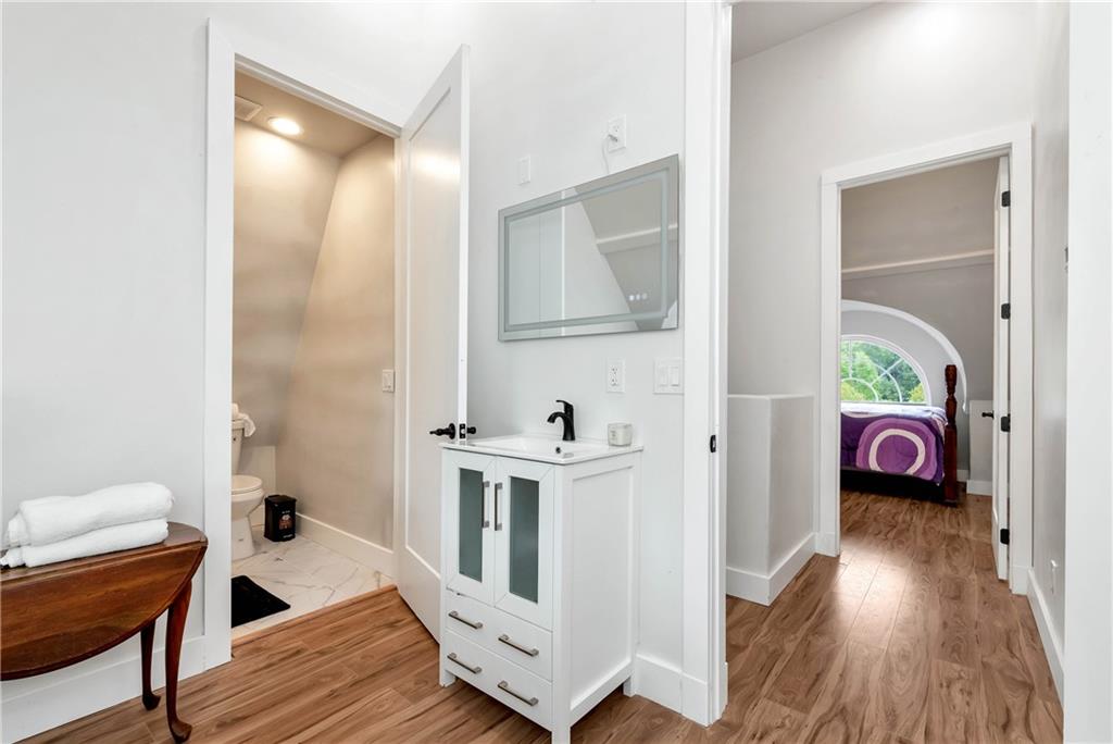 1197 Dee Kennedy Road Auburn, GA 30011 - Photo 43 of 78 a view of kitchen and living room