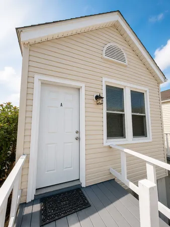 a view of a house with a white door