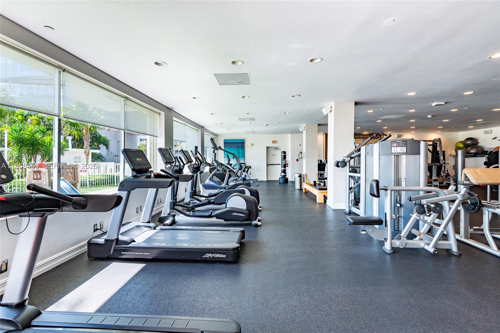 2451 Brickell Avenue, Unit PHM Miami, FL 33129 - Photo 11 of 40 a view of a room with gym equipment