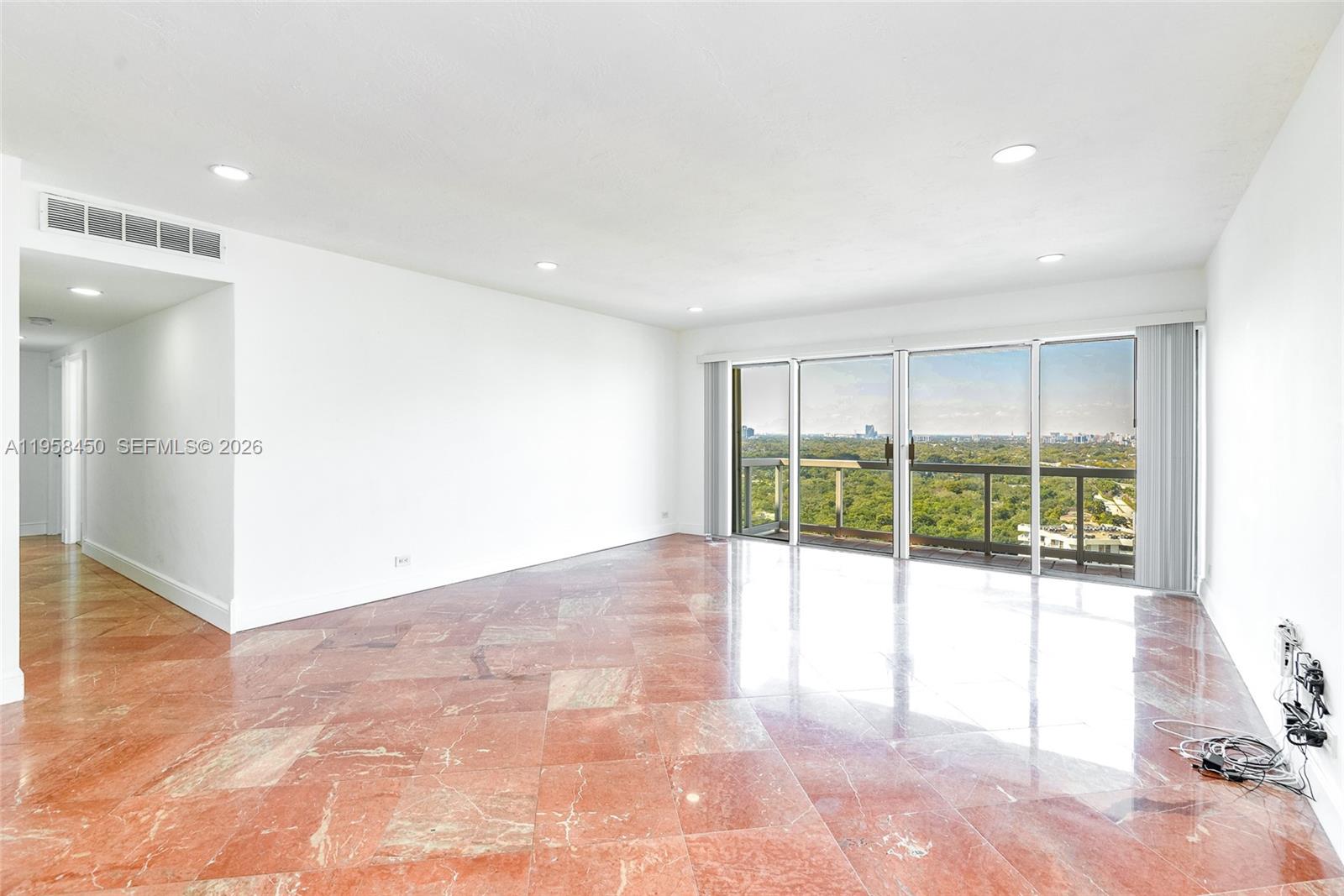 2451 Brickell Avenue, Unit PHM Miami, FL 33129 - Photo 13 of 40 a view of an empty room with a window