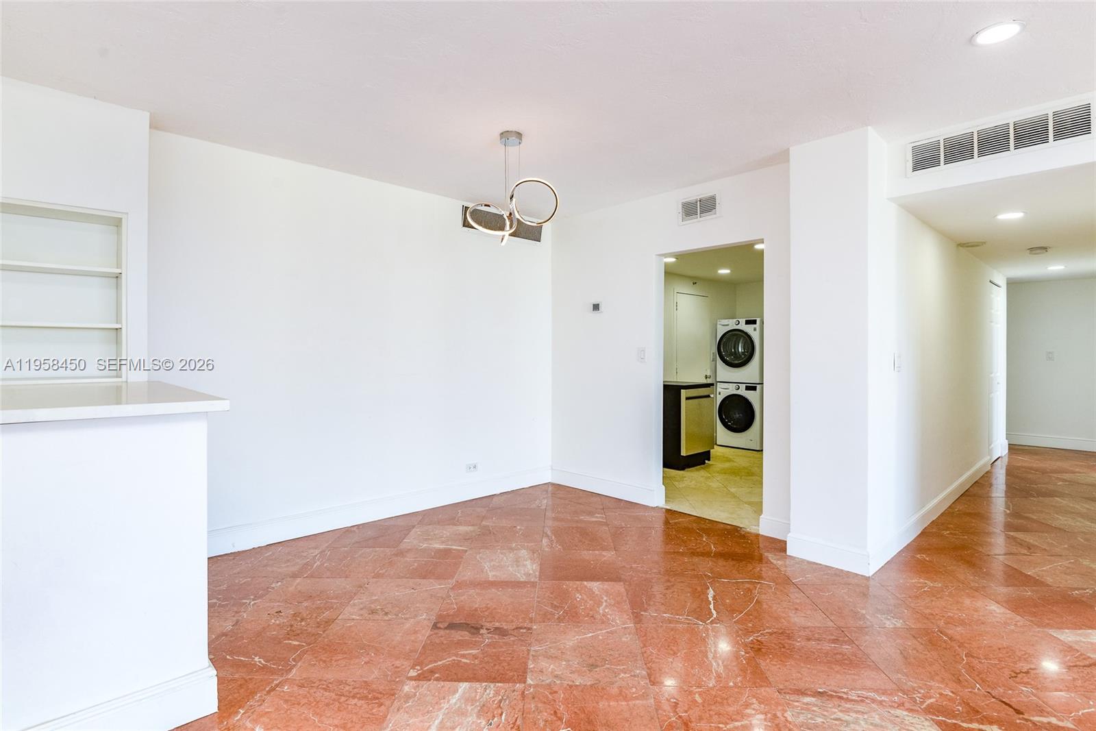 2451 Brickell Avenue, Unit PHM Miami, FL 33129 - Photo 14 of 40 a view of empty room with wooden floor