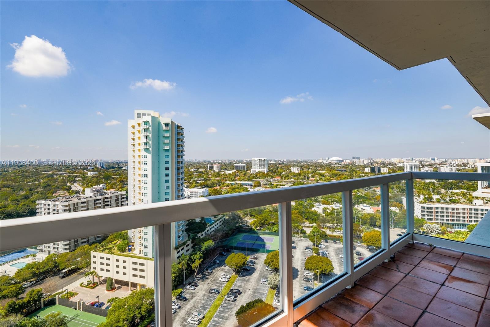 2451 Brickell Avenue, Unit PHM Miami, FL 33129 - Photo 32 of 40 a view of a city from a balcony