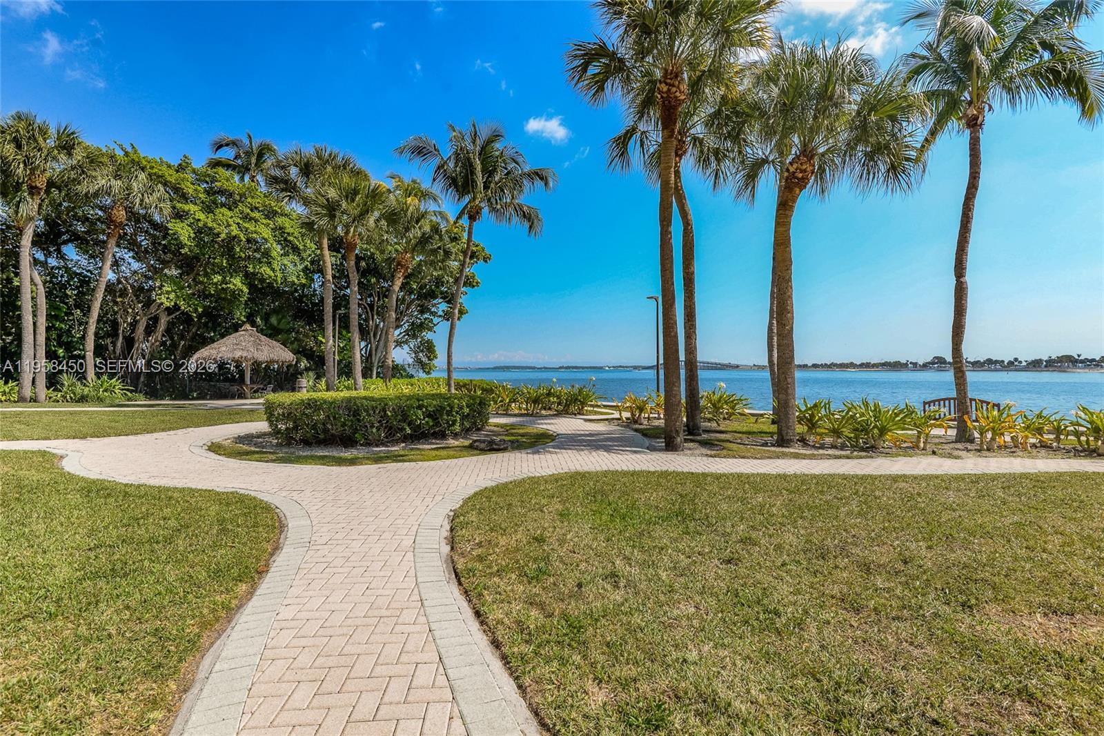 2451 Brickell Avenue, Unit PHM Miami, FL 33129 - Photo 38 of 40 a view of a swimming pool with a yard