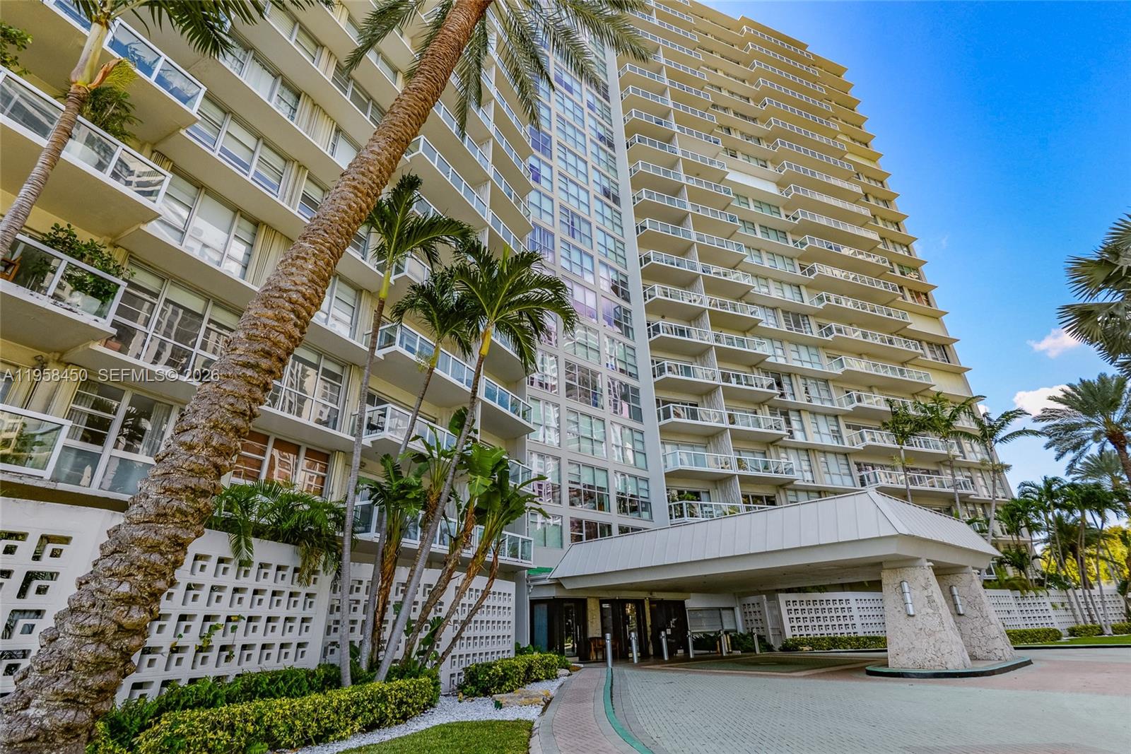 2451 Brickell Avenue, Unit PHM Miami, FL 33129 - Photo 40 of 40 a tall building sitting on the side of a street
