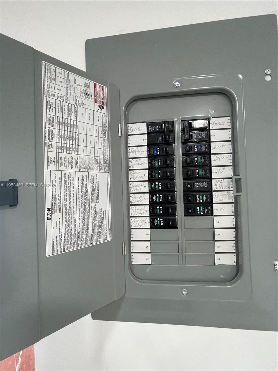 2451 Brickell Avenue, Unit PHM Miami, FL 33129 - Photo 50 of 52 a black and white photo of a living room