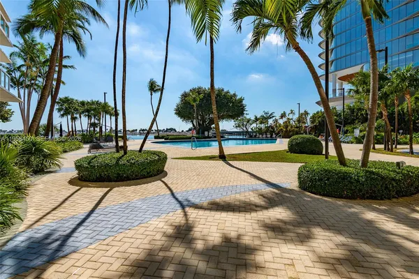 a view of outdoor space with palm trees