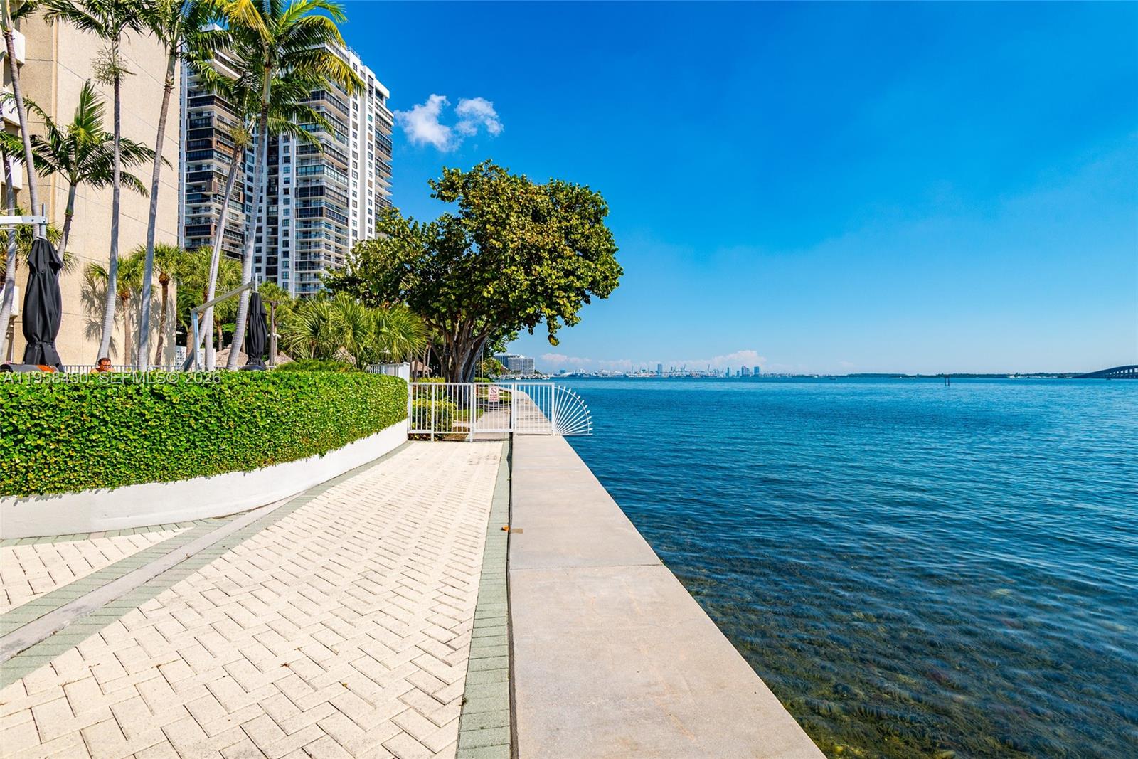 2451 Brickell Avenue, Unit PHM Miami, FL 33129 - Photo 8 of 40 a view of an ocean from a balcony