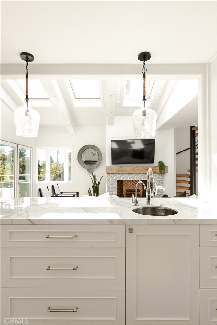 781 Summit Drive Laguna Beach, CA 92651 - Photo 20 of 73 a bathroom with a sink and a mirror