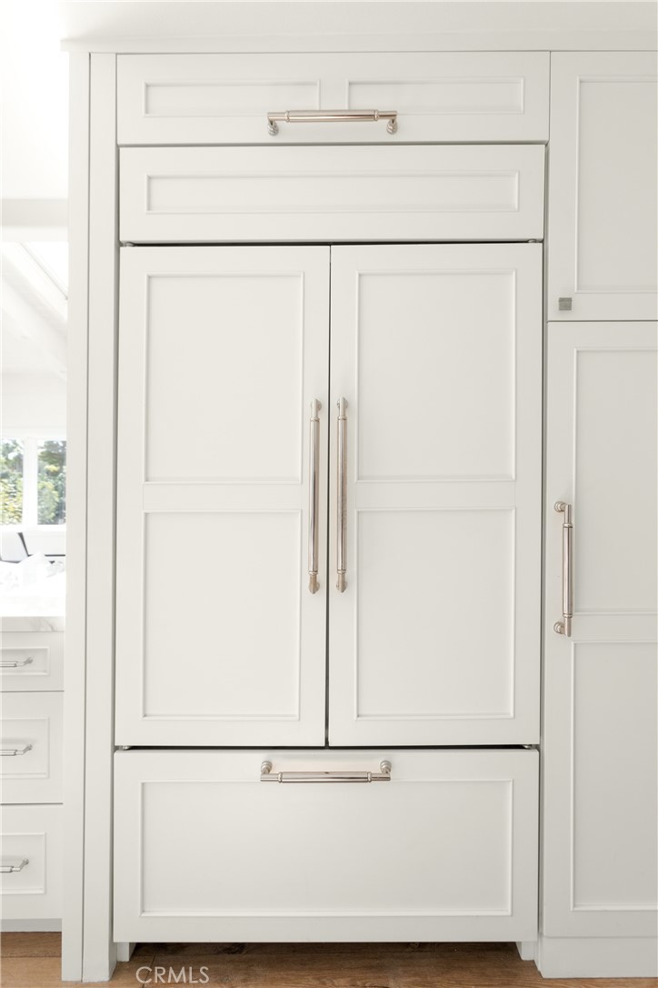 781 Summit Drive Laguna Beach, CA 92651 - Photo 22 of 73 a white refrigerator freezer and a dishwasher sitting area