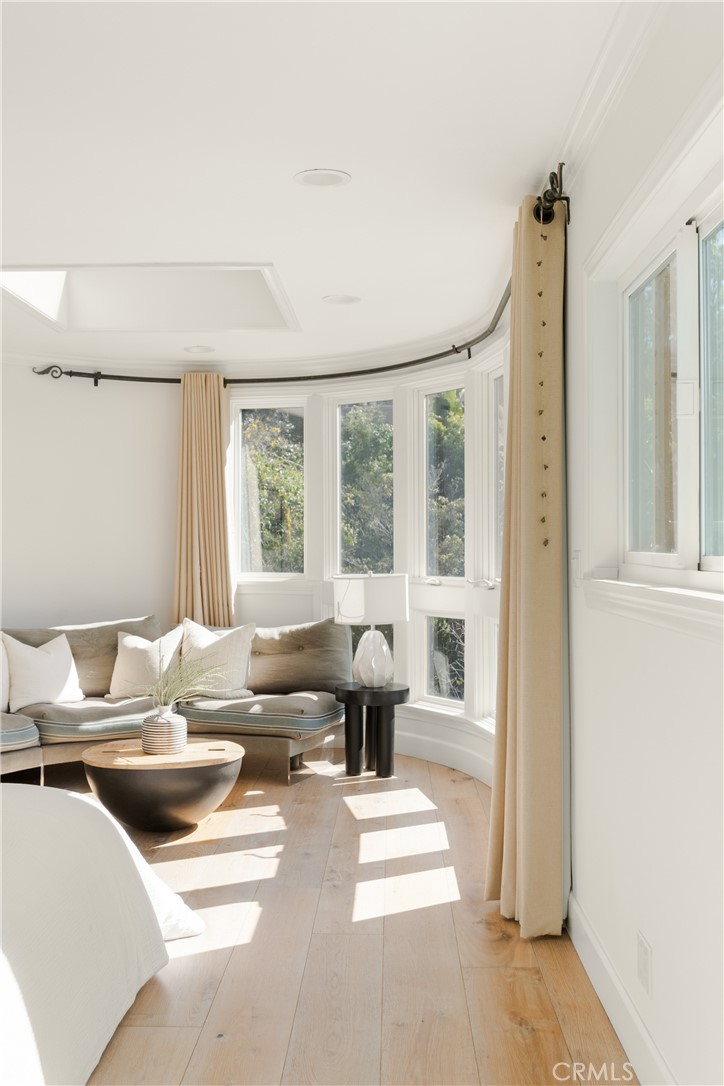 781 Summit Drive Laguna Beach, CA 92651 - Photo 29 of 73 a living room with furniture and large windows