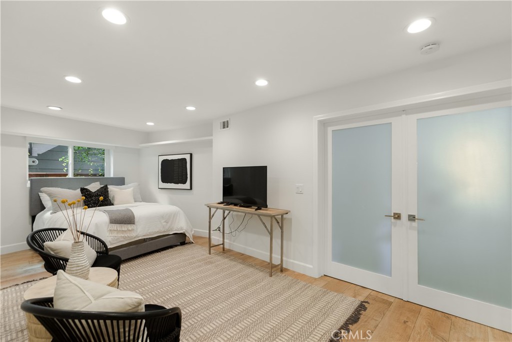 781 Summit Drive Laguna Beach, CA 92651 - Photo 47 of 73 a living room with furniture and a flat screen tv
