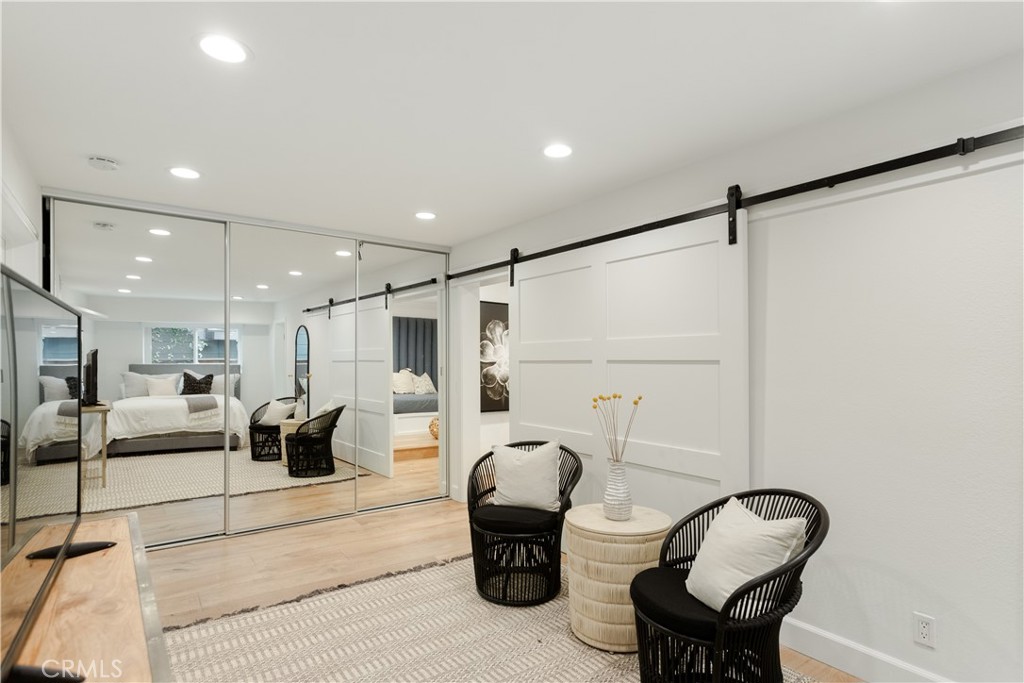 781 Summit Drive Laguna Beach, CA 92651 - Photo 48 of 73 a living room with furniture and a large mirror