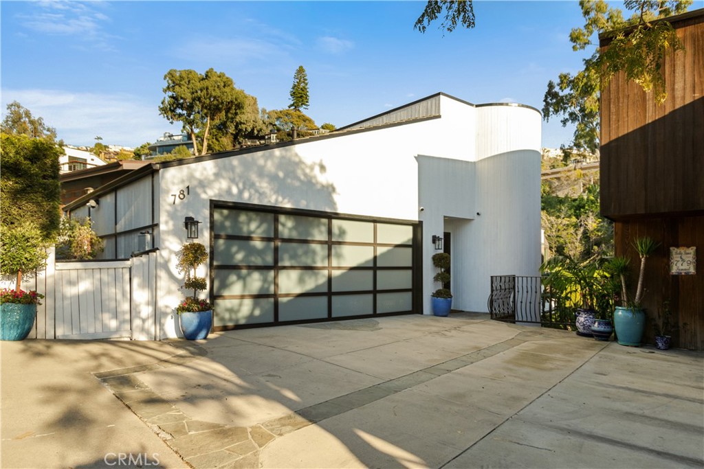 781 Summit Drive Laguna Beach, CA 92651 - Photo 5 of 73 a view of a house with a garage