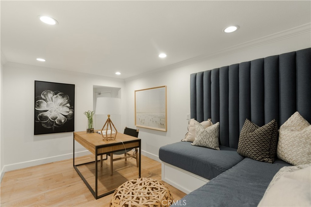 781 Summit Drive Laguna Beach, CA 92651 - Photo 51 of 73 a living room with furniture and a wooden floor
