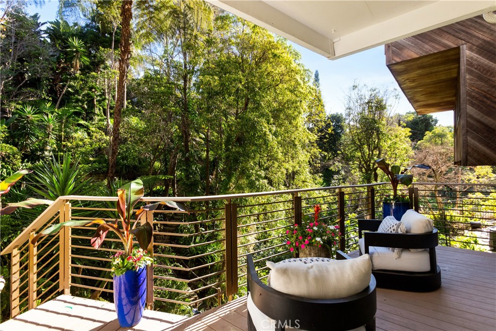 781 Summit Drive Laguna Beach, CA 92651 - Photo 57 of 73 a view of a balcony with couple of chairs