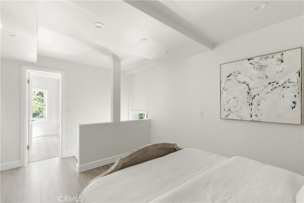 781 Summit Drive Laguna Beach, CA 92651 - Photo 59 of 73 a bedroom with a bed and a refrigerator