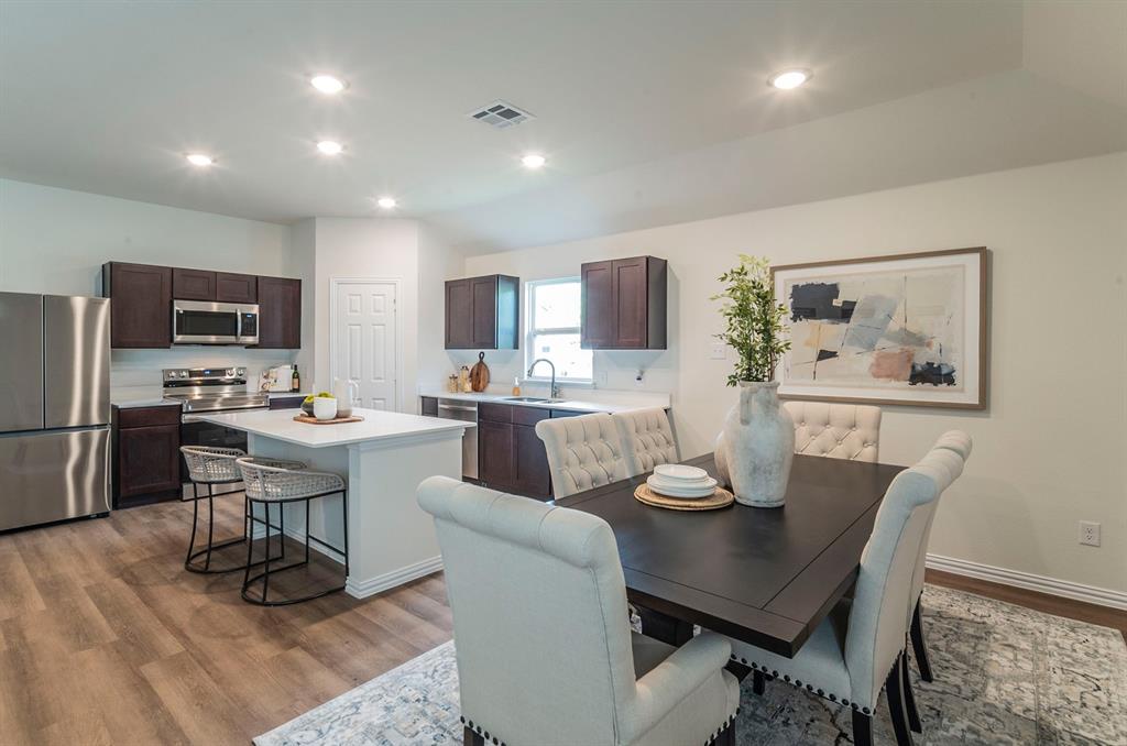 440 Rose Avenue Cleburne, TX 76033 - Photo 5 of 14 a view of a dining room with furniture