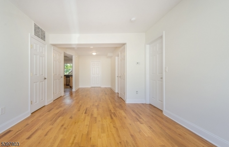 15 Olyphant Place, Unit 2 Morristown, NJ 07960 - Photo 2 of 7 a view of hallway with wooden floor