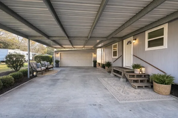 a view of a garage with chairs