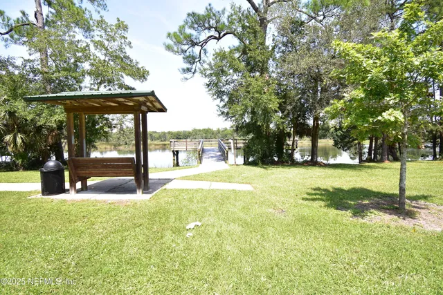 a view of a lake and trees