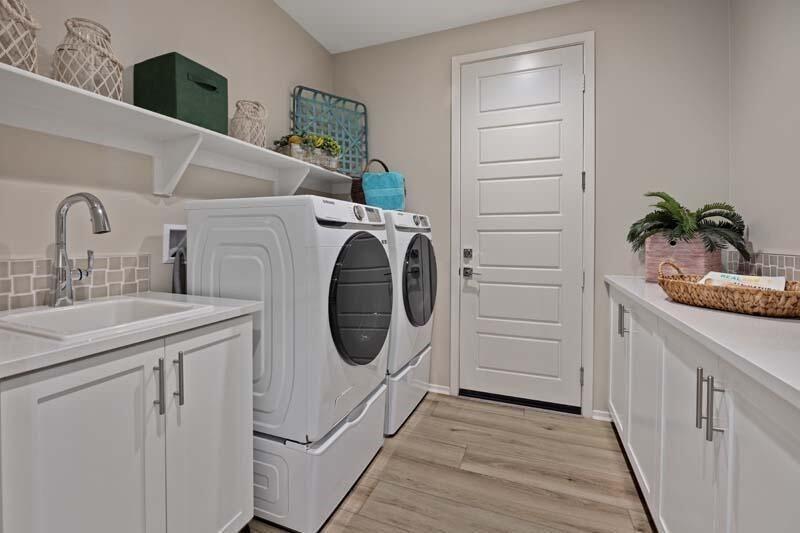 38902 Malva Rosa Drive Palmdale, CA 93551 - Photo 14 of 17 a utility room with sink dryer and washer