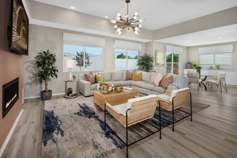 38902 Malva Rosa Drive Palmdale, CA 93551 - Photo 2 of 17 a living room with furniture and a fireplace