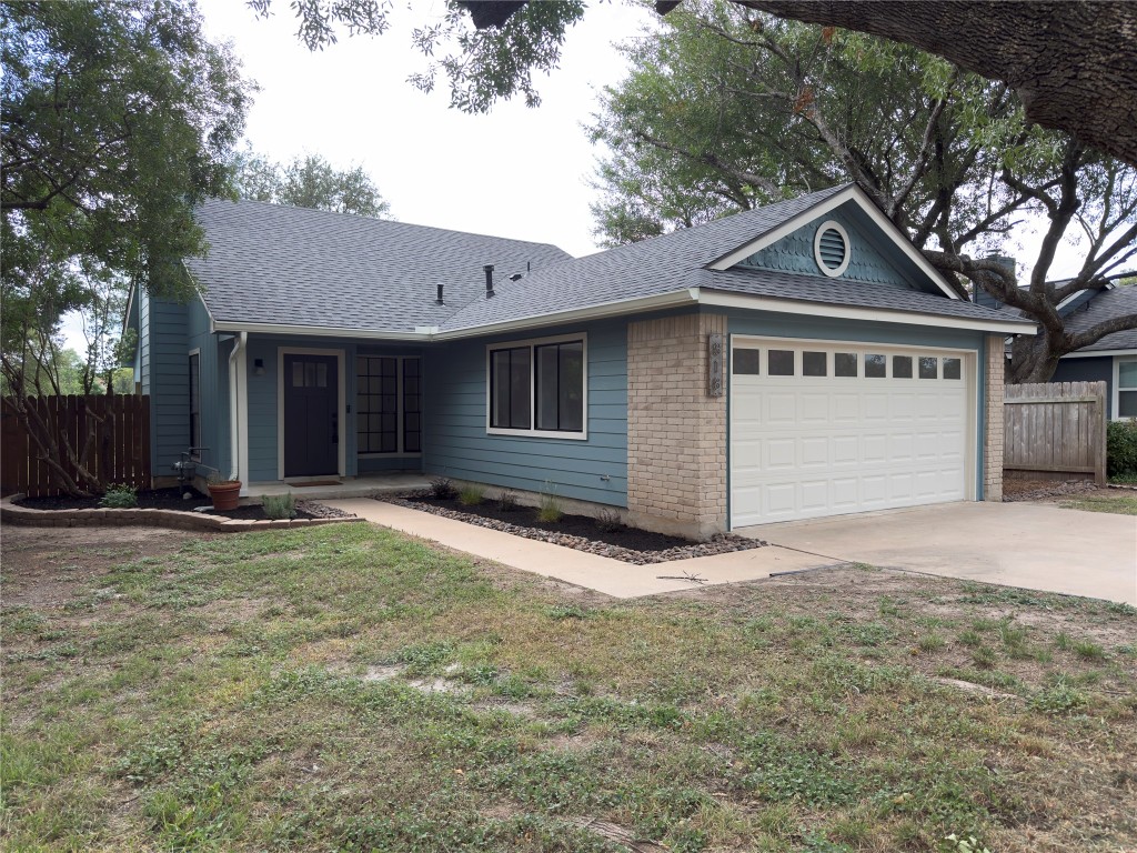 818 Russet Valley Drive Cedar Park, TX 78613 - Photo 1 of 17 a view of a house with a yard and garage