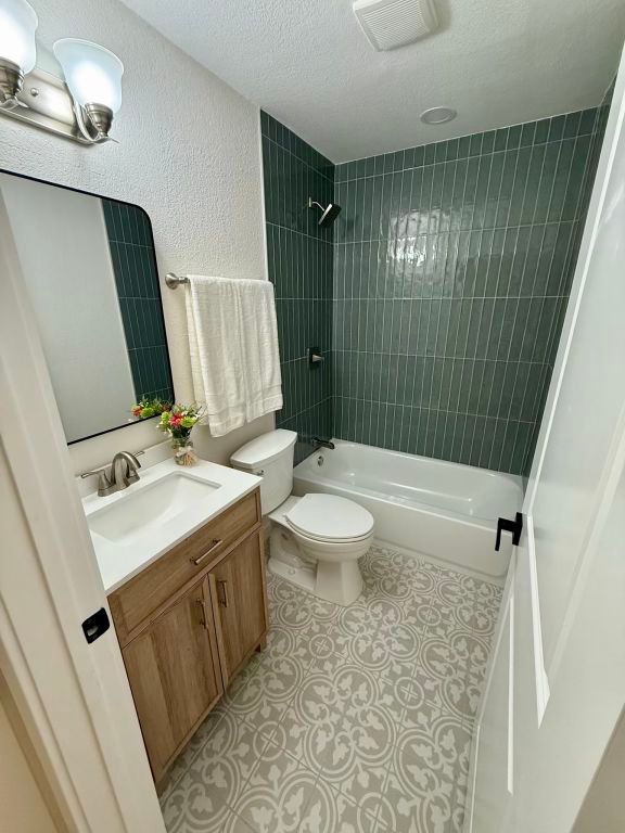 818 Russet Valley Drive Cedar Park, TX 78613 - Photo 12 of 17 a bathroom with a sink toilet and shower