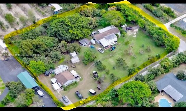 12495 Southwest 240th Street Homestead, FL 33032 - Photo 2 of 26 an aerial view of a house with a yard