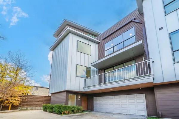 a front view of a house with balcony