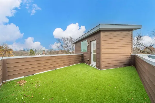 a view of a backyard with a garden