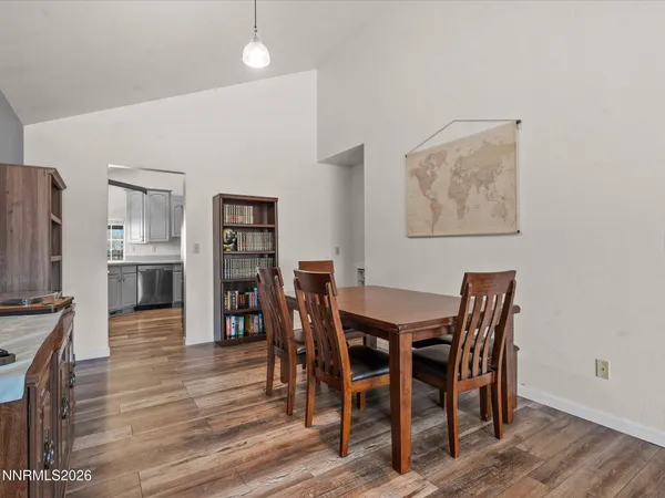a view of a dining room with furniture