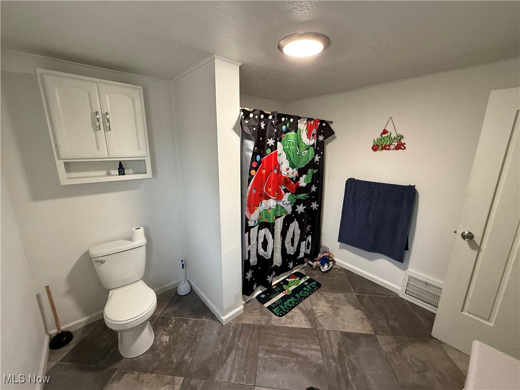446 Warner Road Southeast Vienna, OH 44473 - Photo 23 of 32 Bathroom with toilet