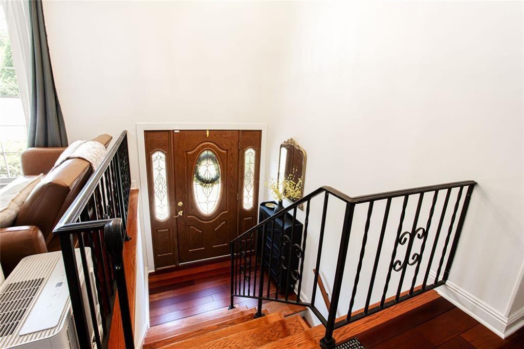 2814 Goodfellows Road Tucker, GA 30084 - Photo 11 of 46 a view of a balcony with furniture and wooden floor