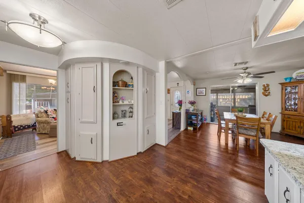 a bedroom with furniture and a window