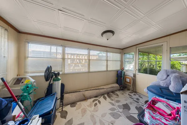 a view of storage and utility room with washer and dryer