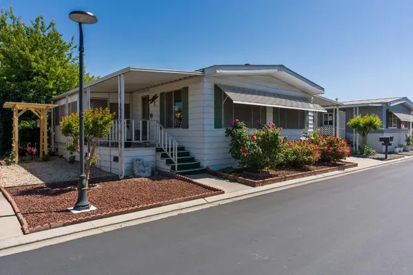 a front view of a house with porch