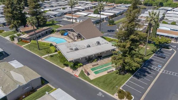 an aerial view of a house with a garden