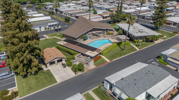 an aerial view of a house with a garden