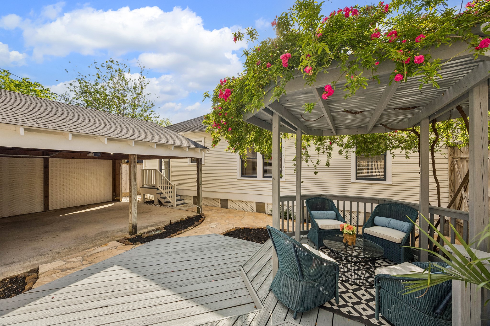 812 West 13th Street Houston, TX 77008 - Photo 26 of 29 Charming backyard featuring a cozy gazebo with seating and lush greenery, alongside a spacious covered patio area. Perfect for relaxing and entertaining.