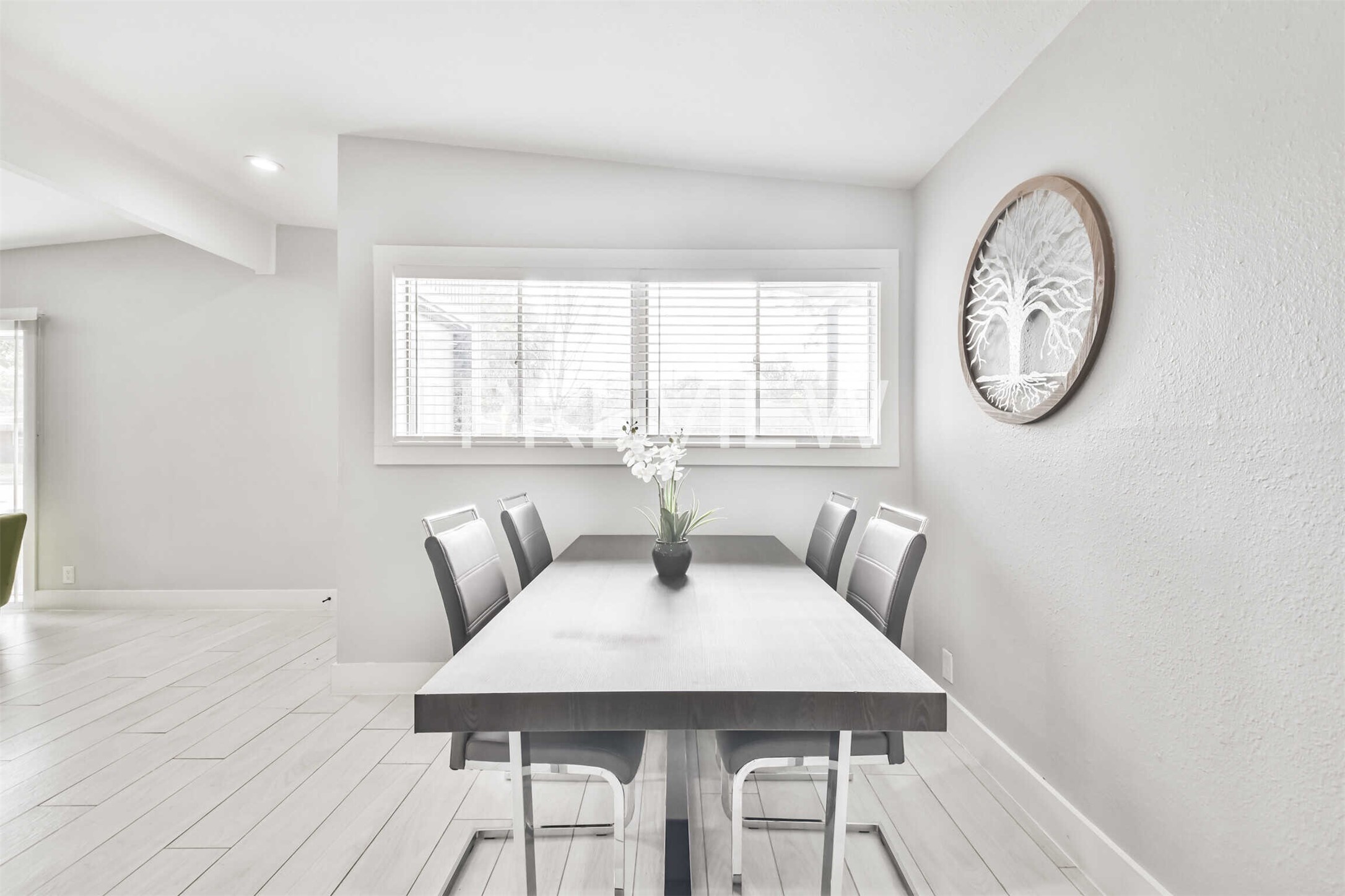 7522 Dearborn Street Houston, TX 77055 - Photo 23 of 39 a view of a dining room with furniture and wooden floor