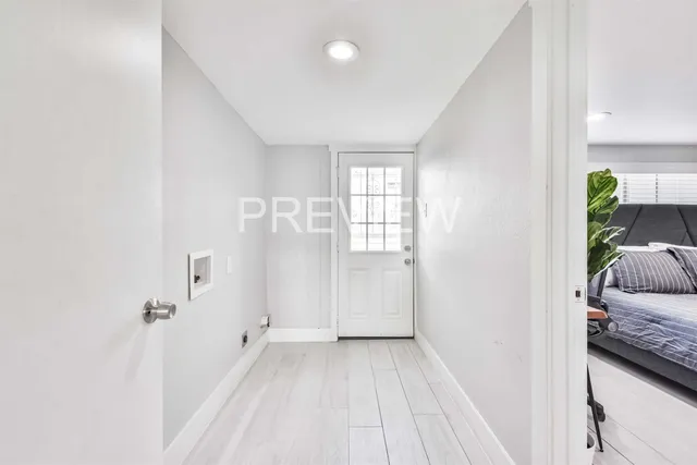 a view of livingroom with hardwood floor and a ceiling fan