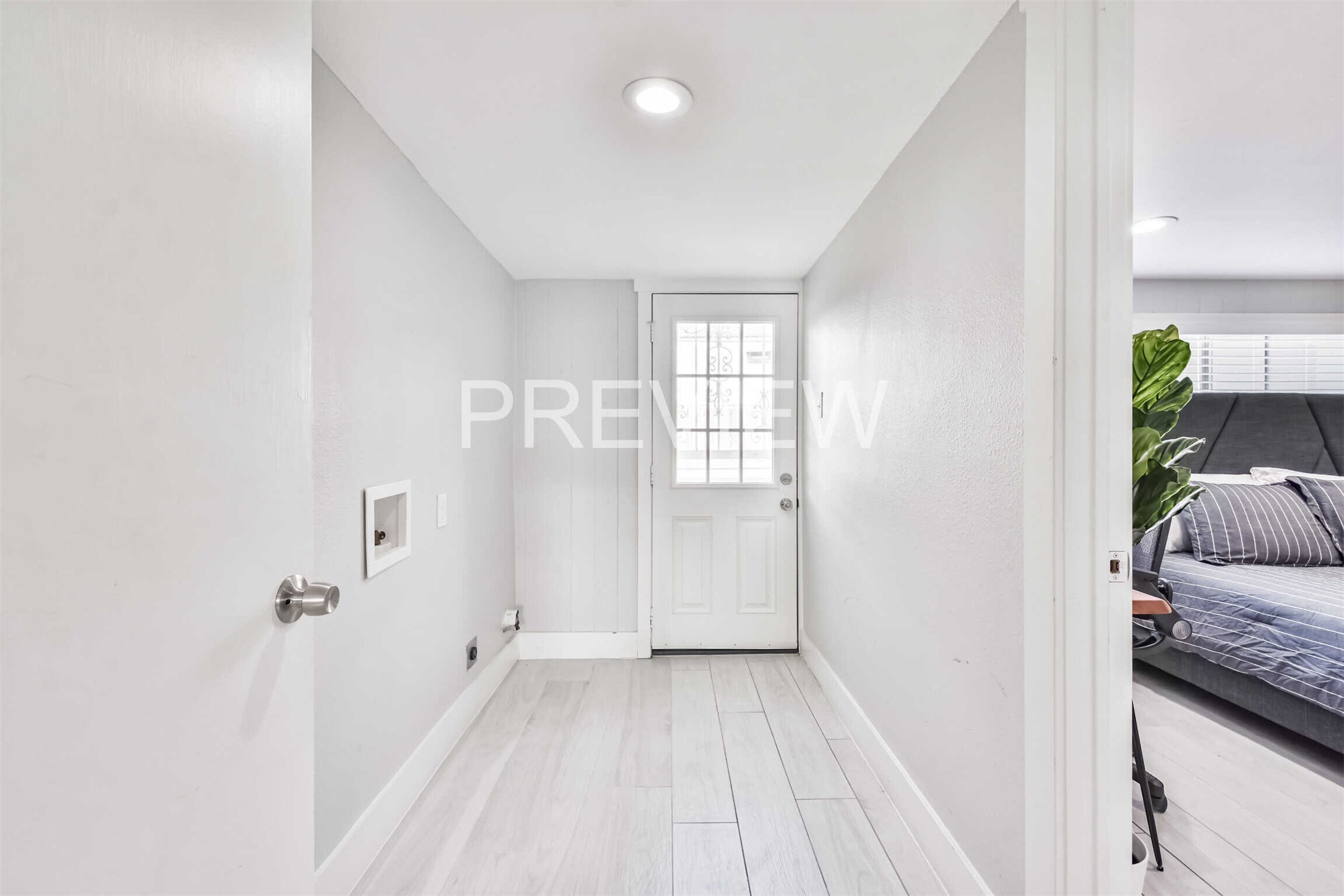 7522 Dearborn Street Houston, TX 77055 - Photo 26 of 39 a view of livingroom with hardwood floor and a ceiling fan